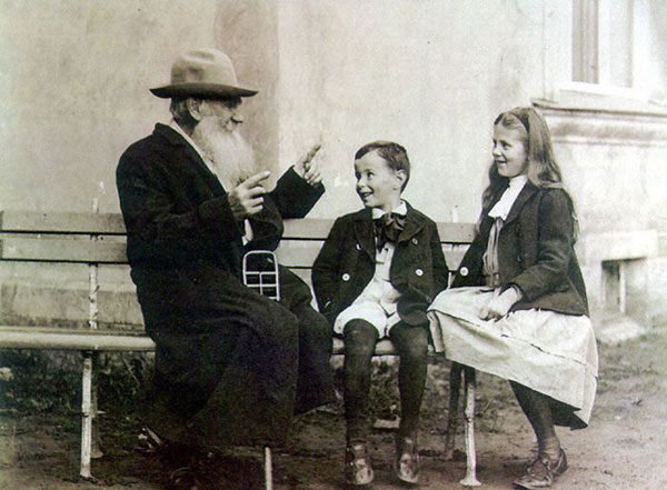 Leo Tolstoy telling a story to his grandchildren in 1909